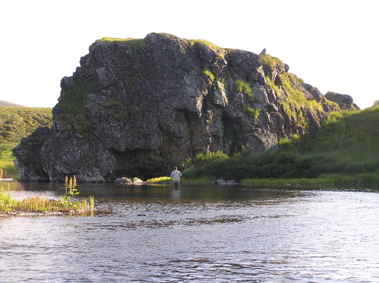 Angler fishing on the middle fork of the Goodnews River in Alaska