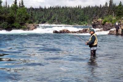 Experienced Alaska wilderness guide standing outdoors